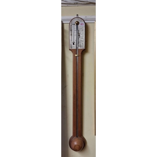 1571 - A reproduction mahogany stick barometer, with silvered dial.