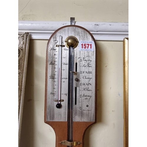 1571 - A reproduction mahogany stick barometer, with silvered dial.