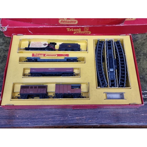 1593 - Four Tri-ang OO gauge railway sets, comprising: RS.3; RS.4; RS.5; and R3L, each boxed; together... 