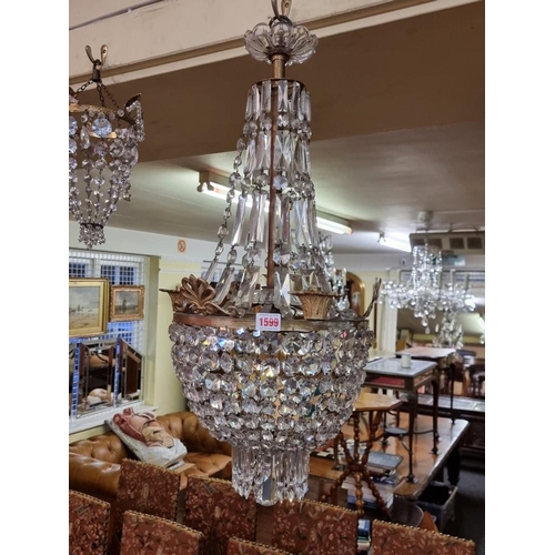 1599 - A good faceted glass chandelier, 75cm high. 