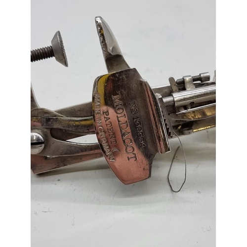 1607 - A Moldacot patent lock stitch rotary sewing machine, No.130334, 20cm long.