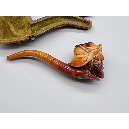 1633 - An interesting Victorian carved meerschaum novelty pipe, depicting a lifeboatman, in fitted leather ... 