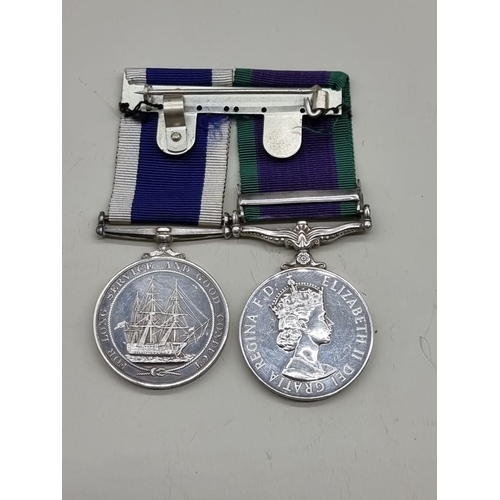 1635 - Medals: a pair or Royal Navy Medals, to FX.670175 BJH Dew, RN. (2)