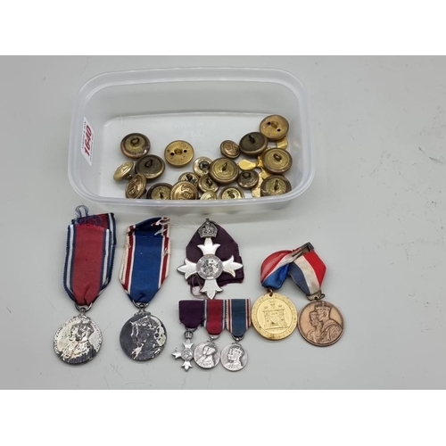 1640 - Medals: an MBE; together with two coronation Medals, related miniatures and other badges etc.... 