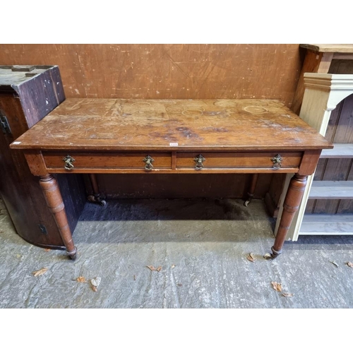 1125 - A late Victorian mahogany two drawer side table, 122cm wide.