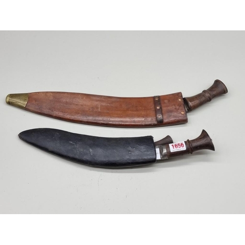 1656 - Two kukris and leather sheaths.