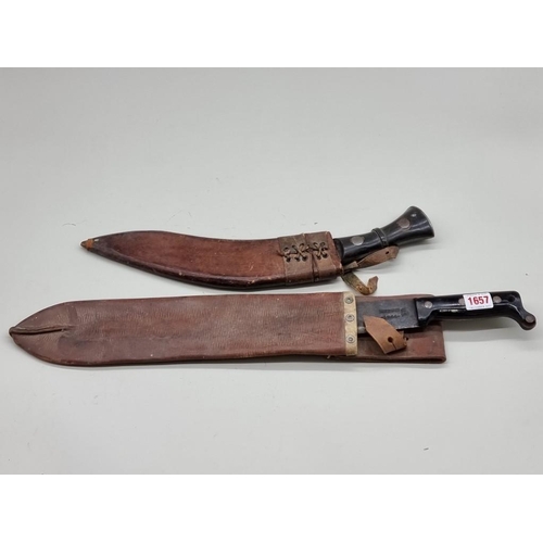 1657 - A kukri and leather sheath, with horn scales; together with a US machete and associated leather shea... 