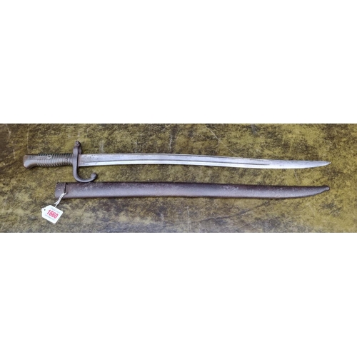 1660 - A French M1866 chassepot 'Yataghan' sword bayonet and steel scabbard, dated 1872.