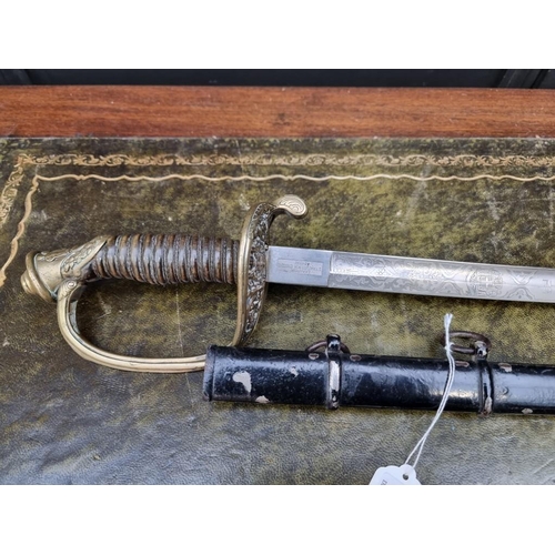 1661 - A World War I Greek cavalry officer's sword and scabbard, by Carl Eickhorn, Solingen, the 84cm ... 