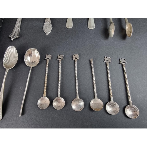 102 - A cased silver child's spoon and pusher; together with a quantity of silver cutlery; a silver mounte... 