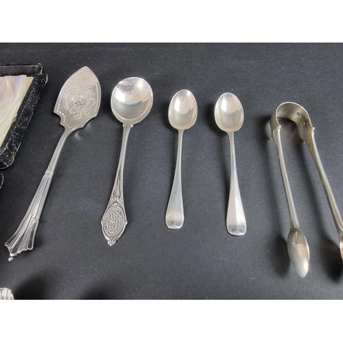 102 - A cased silver child's spoon and pusher; together with a quantity of silver cutlery; a silver mounte... 