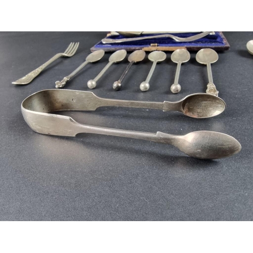 106 - A small quantity of silver cutlery, to include a pair of Victorian fiddle pattern sugar tongs, by&nb... 