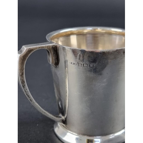 11 - A silver Christening mug, by Ernest W Haywood, Birmingham 1946, 7.5cm high, 110g.