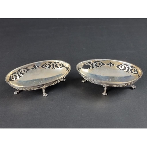 112 - A pair of silver bonbon dishes, by James Deakin & Sons, Sheffield 1928 and 1930, 13cm wide, 125g... 