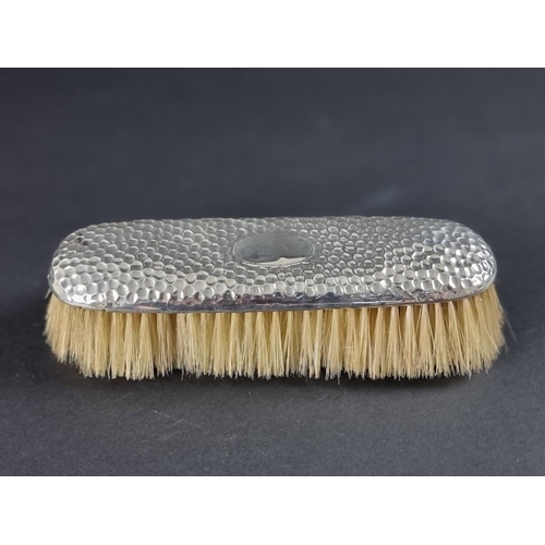 119 - An Edwardian silver mounted hairbrush, by Levi & Salaman, Birmingham 1903.