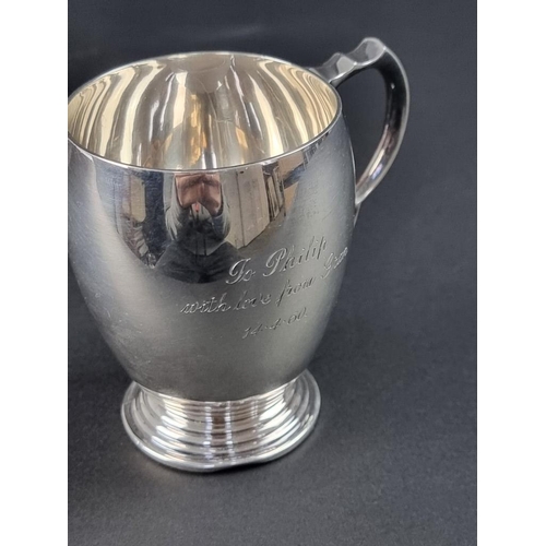 12 - A silver Christening mug, by Atkin Brothers, Sheffield 1955, 8.5cm high, 130g.