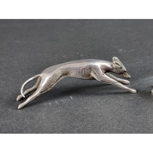 120 - A pair of silver plated greyhounds, 8.5cm long.