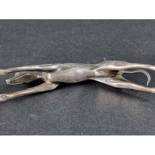 120 - A pair of silver plated greyhounds, 8.5cm long.