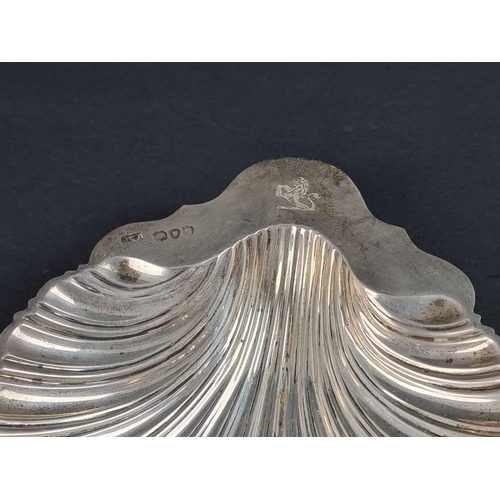 137 - A Victorian silver shell butter dish, by Josiah Williams & Co, London 1891, 14cm; together with ... 