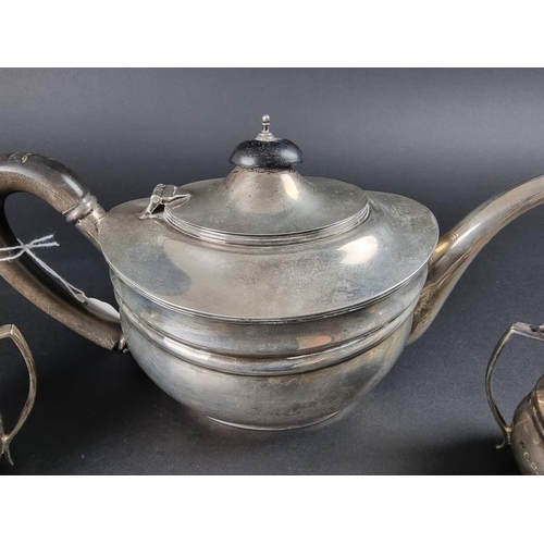 145 - A Georgian style silver three piece tea set, by C S Harris & Sons Ltd, London 1919 and 1921, the... 