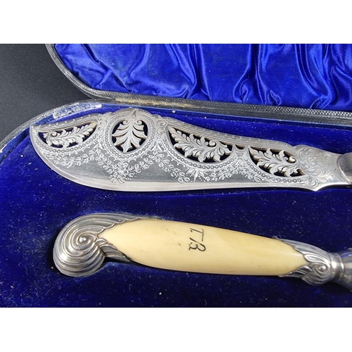 152 - A cased pair of Victorian EPNS fish servers, by Walker & Hall, Sheffield 1897, with ivory handle... 