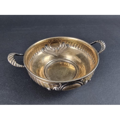 163 - An Edwardian silver twin handled quaich, by Henry Stratford Ltd, London 1901, 13cm wide, 97g.... 