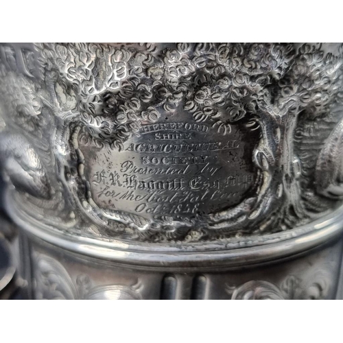 170 - A George II silver twin handled cup, by Benjamin Cartwright I, London 1757, later embossed, 12cm hig... 