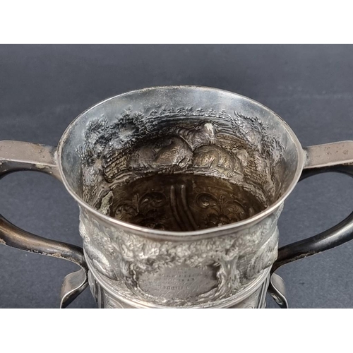 170 - A George II silver twin handled cup, by Benjamin Cartwright I, London 1757, later embossed, 12cm hig... 