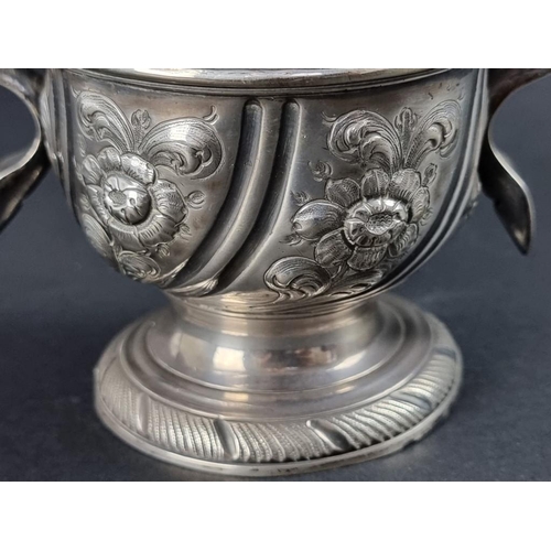 170 - A George II silver twin handled cup, by Benjamin Cartwright I, London 1757, later embossed, 12cm hig... 