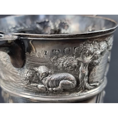 170 - A George II silver twin handled cup, by Benjamin Cartwright I, London 1757, later embossed, 12cm hig... 