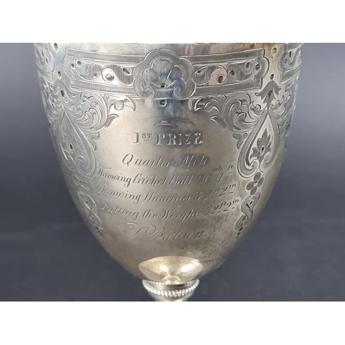 174 - A Victorian silver pedestal cup, by George John Richards & Edward Charles Brown, London 1866, 18... 