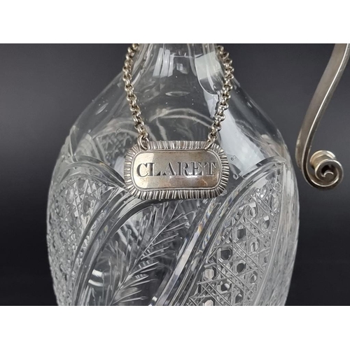 182 - A silver mounted cut glass claret jug, by Edward Barnard & Sons Ltd, London 1911, 34cm high; tog... 