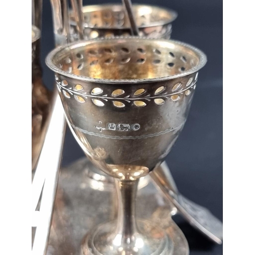 21 - A Victorian silver egg cruet, by Jehoiada Alsop Rhodes, Sheffield 1872, 22cm, lacking one spoon, 446... 