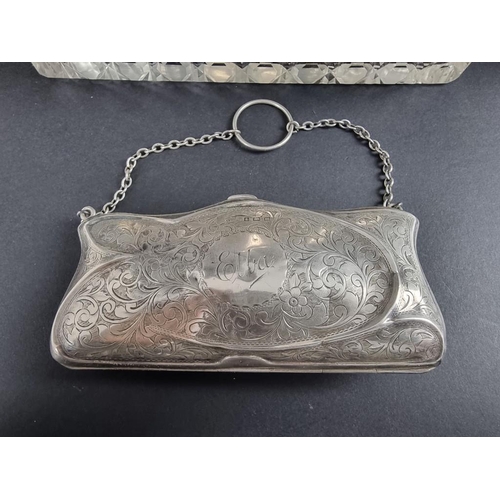 227 - A silver purse, by Turnbull Bros, Birmingham 1911, 12.5cm long; together with a pair of silver dwarf... 