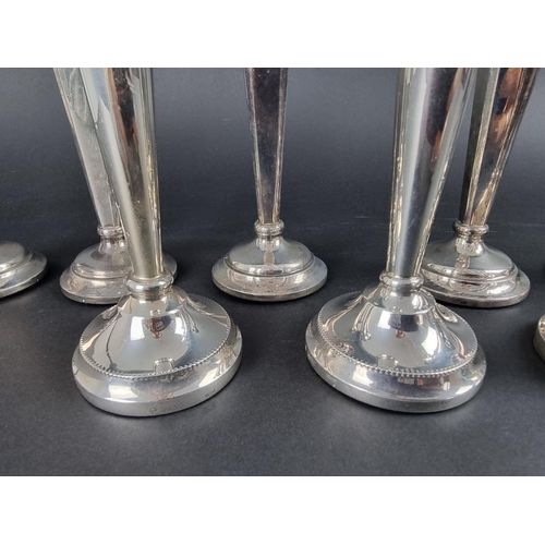 229 - A set of six silver candlesticks, by Sanders & Mackenzie, Birmingham 1970, 16cm high; together w... 