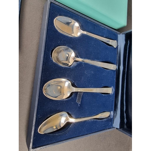 231 - Four white metal teaspoons, stamped 'Tiffany & Co Sterling', 83.3g.