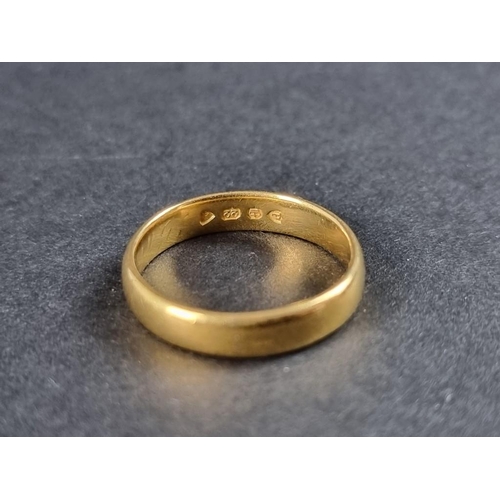 254 - A 22ct gold wedding band, size R, 5.7g.