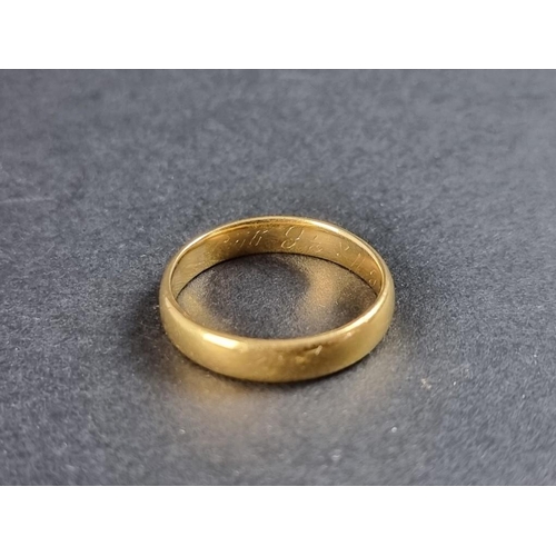 254 - A 22ct gold wedding band, size R, 5.7g.