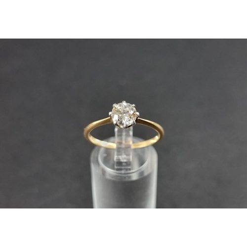 262 - A yellow metal diamond solitaire ring, of approximately 0.75ct, stamped 18ct, size T.... 