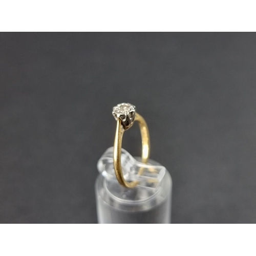 268 - An 18ct gold illusion set diamond solitaire ring, of approximately 0.125ct, size J.