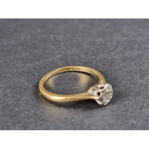 268 - An 18ct gold illusion set diamond solitaire ring, of approximately 0.125ct, size J.