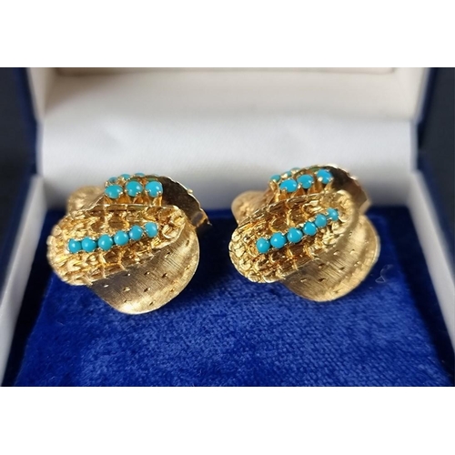 285 - A pair of gold and turquoise floral ear clips, stamped 750, 22mm.