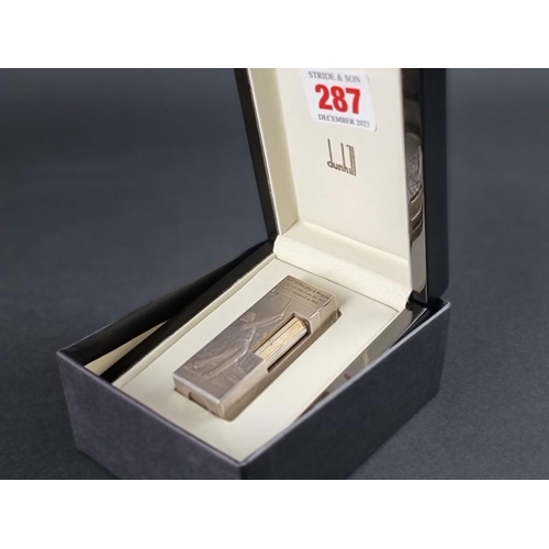 287 - Of Golfing Interest; a rare Alfred Dunhill limited edition silver cigarette lighter, designed by Cli... 