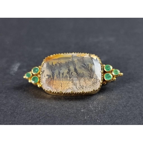 288 - An antique dendritic agate and emerald brooch, in a yellow metal mount, 44 x 19mm, cased.... 