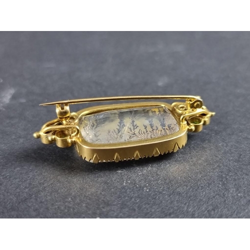 288 - An antique dendritic agate and emerald brooch, in a yellow metal mount, 44 x 19mm, cased.... 