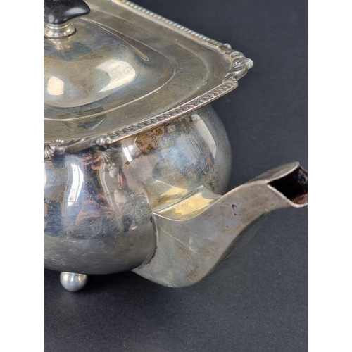 3 - A silver teapot, by James Parkes, London 1913, 9cm high excluding handle, 628g.