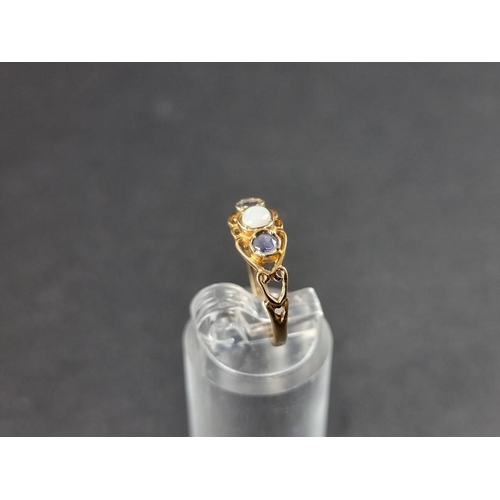 309 - A 9ct gold opal and sapphire ring.