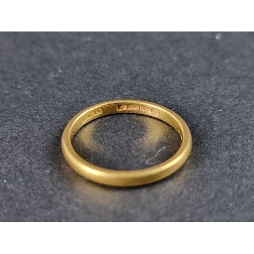 310 - A 22ct gold wedding band, 2.7g.