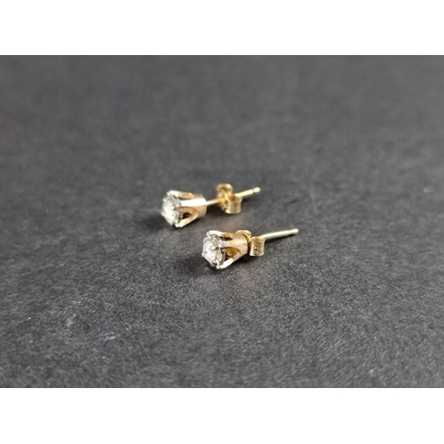 326 - A pair of diamond ear studs, of approximately 0.10ct, stamped 10k.