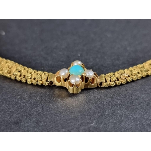 333 - A small Victorian yellow metal bracelet, of fine interlocking links to a split turquoise and seed pe... 